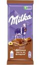 Шоколад молочный Milka с начинкой из ореховой пасты и дробленым фундуком, 80г