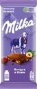 Шоколад молочный MILKA с фундуком и изюмом