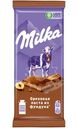 Шоколад молочный Milka с начинкой из ореховой пасты и дробленым фундуком, 80г