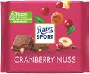 Шоколад молочный RITTER SPORT с кусочками клюквы и орехом лещины, 100г