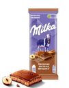 Шоколад молочный Milka с начинкой из ореховой пасты и дробленым фундуком, 80г
