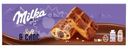 Пирожное Milka бисквитное с шоколадной начинкой и кусочками молочного шоколада, 175г